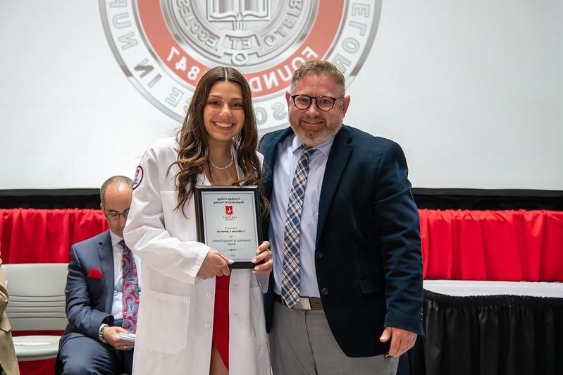 Professor J. Alex Thompson and Catherine Casanovas '23, recipient of the Leadership in Nursing Practice Award, at the 2023 Nursing Pinnin...